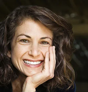 A woman smiling