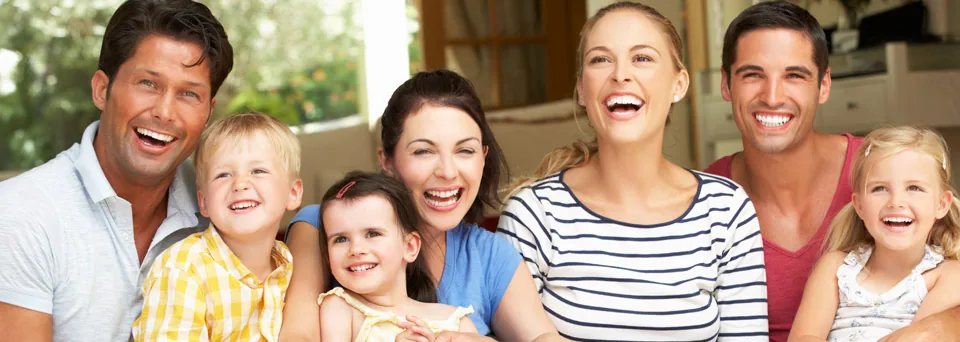 A group of families laughing together